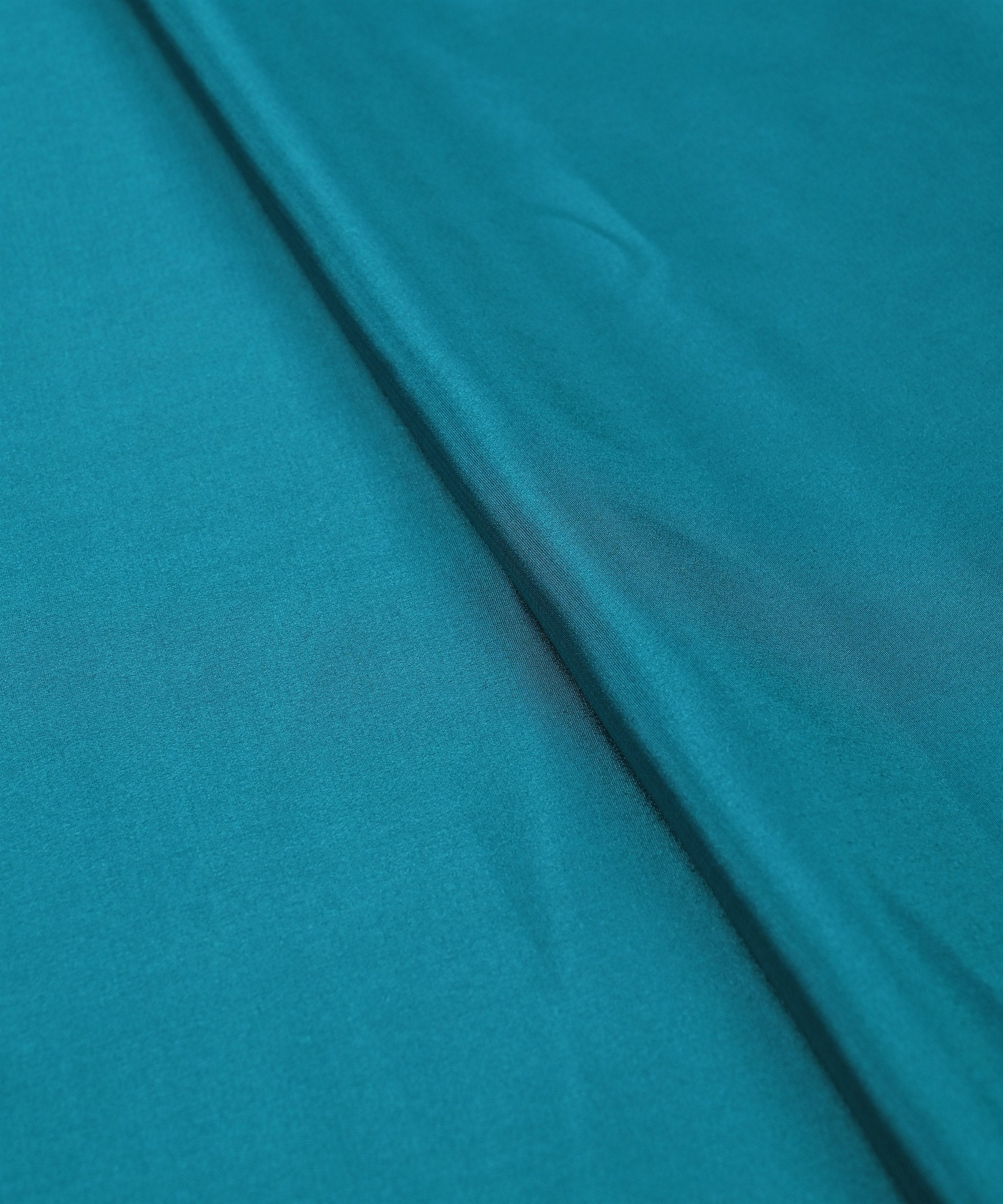 Teal Plain Dyed Crepe Fabric