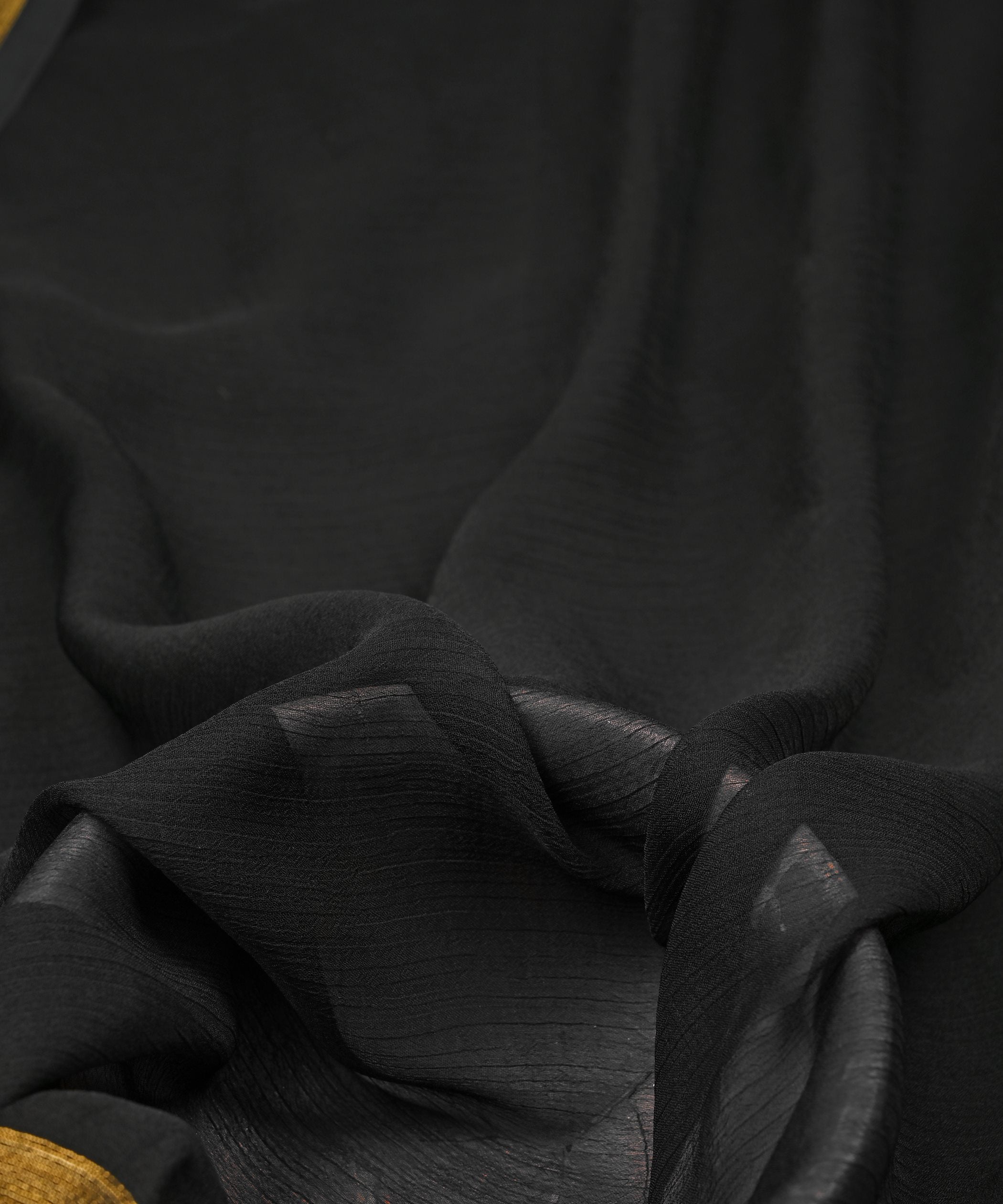 GEORGETTE-WITH-GOLDEN-BORDER-BLACK-FEEL0.jpg