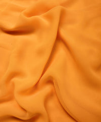 Gold Plain Dyed Georgette (60 Grams) Fabric