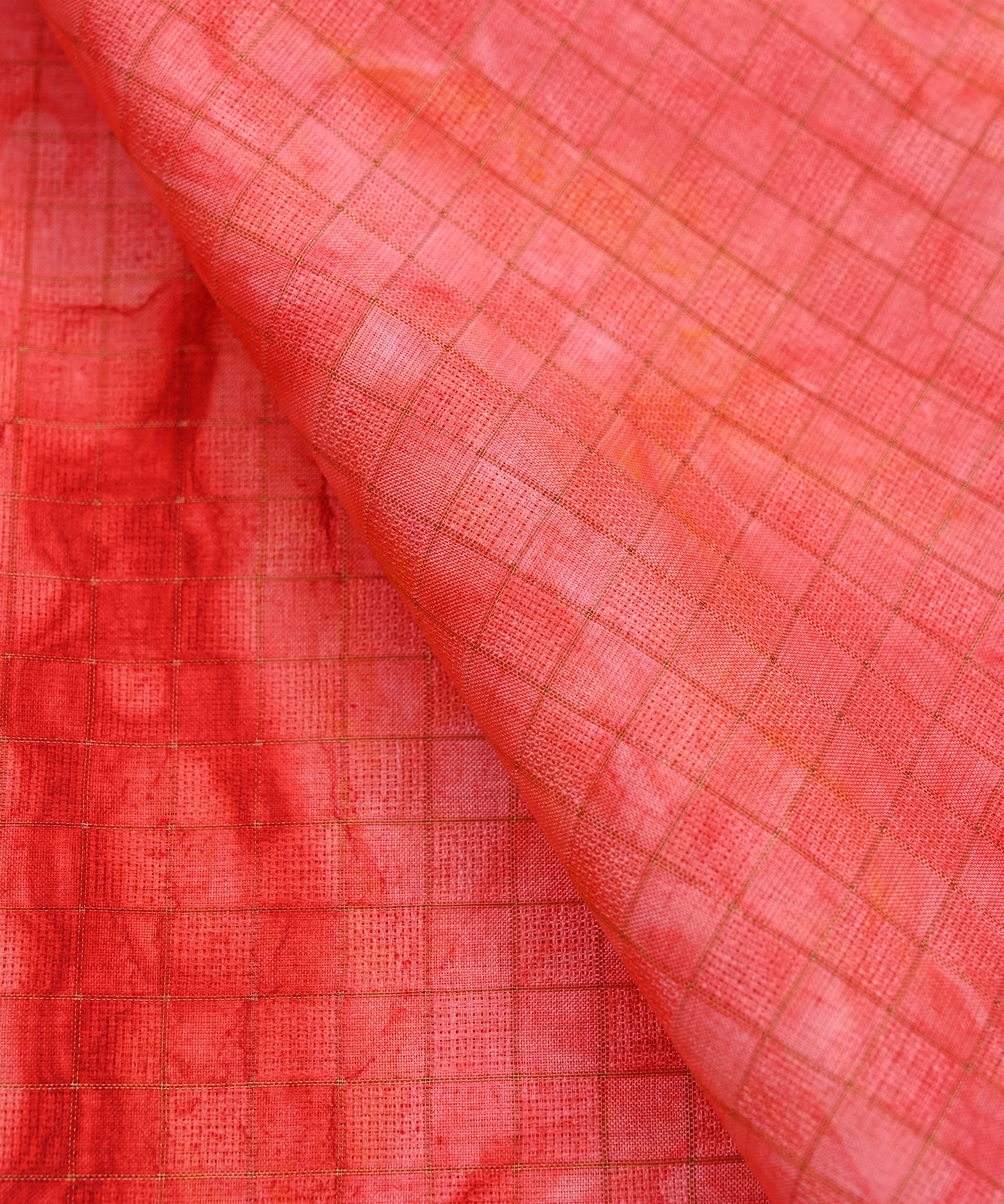 Reddish Pink Jute Fabric with Checks and Shibori Print