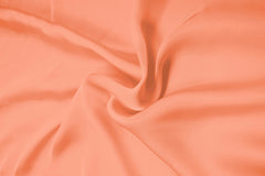 Glossy Peach Plain Dyed Satin Georgette Fabric