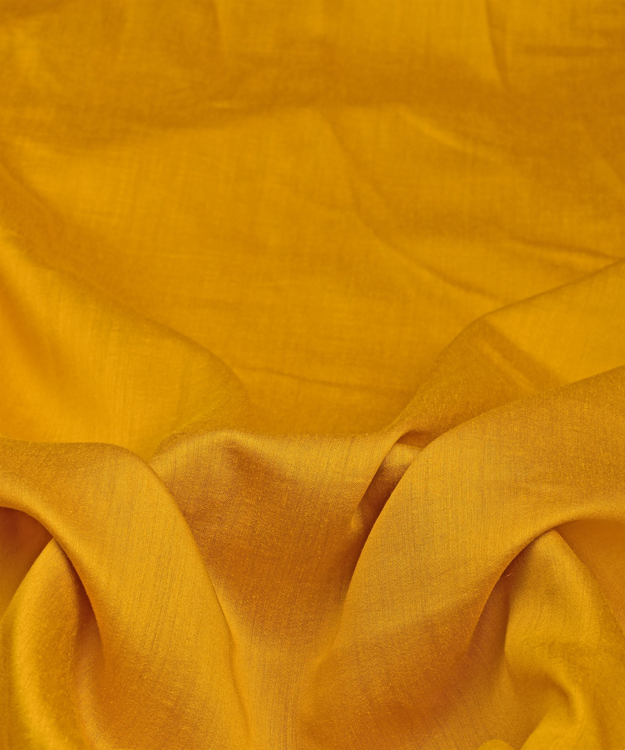 Mustard Yellow Plain Dyed Semi Muslin Fabric