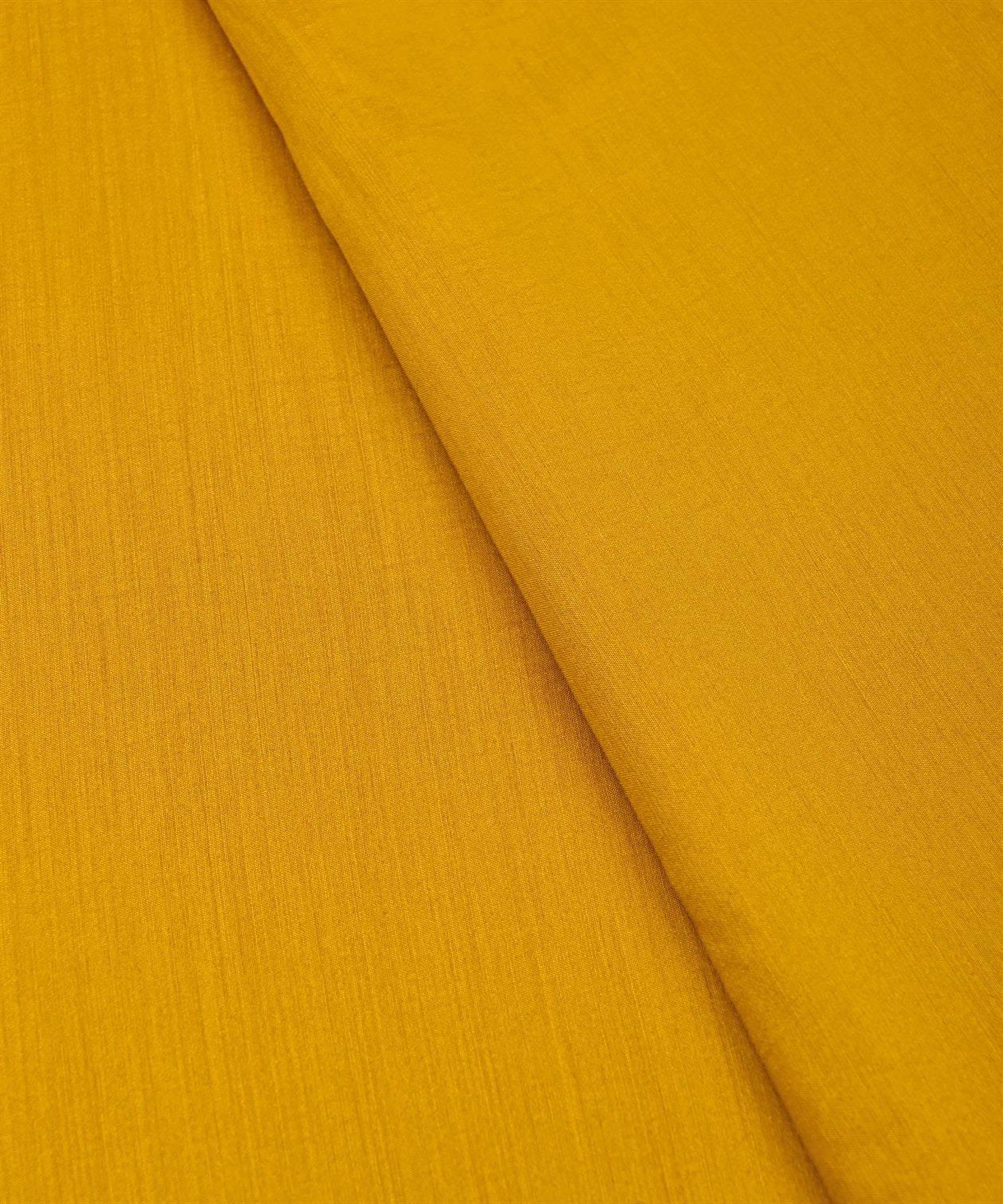 Mustard Yellow Plain Dyed Semi Muslin Fabric