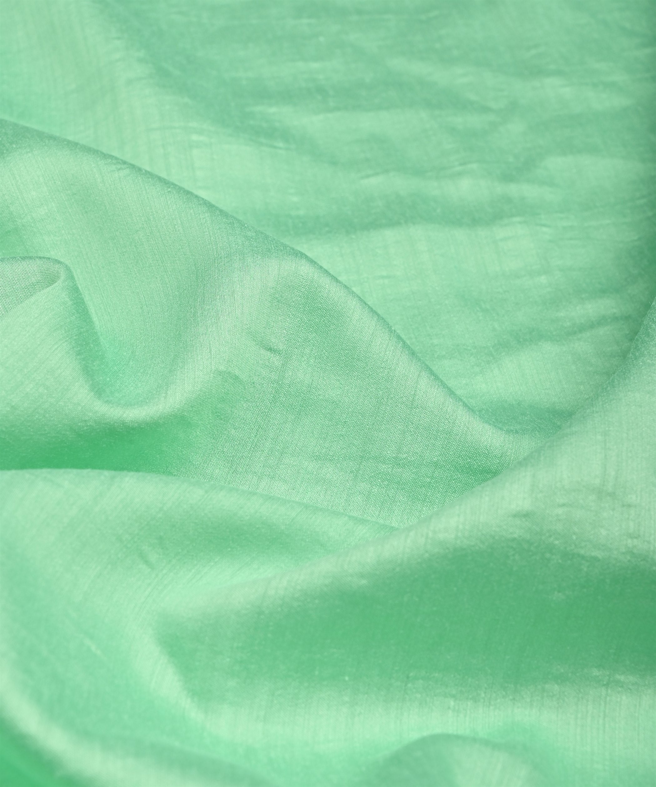 Sea Green Plain Dyed Semi Muslin Fabric