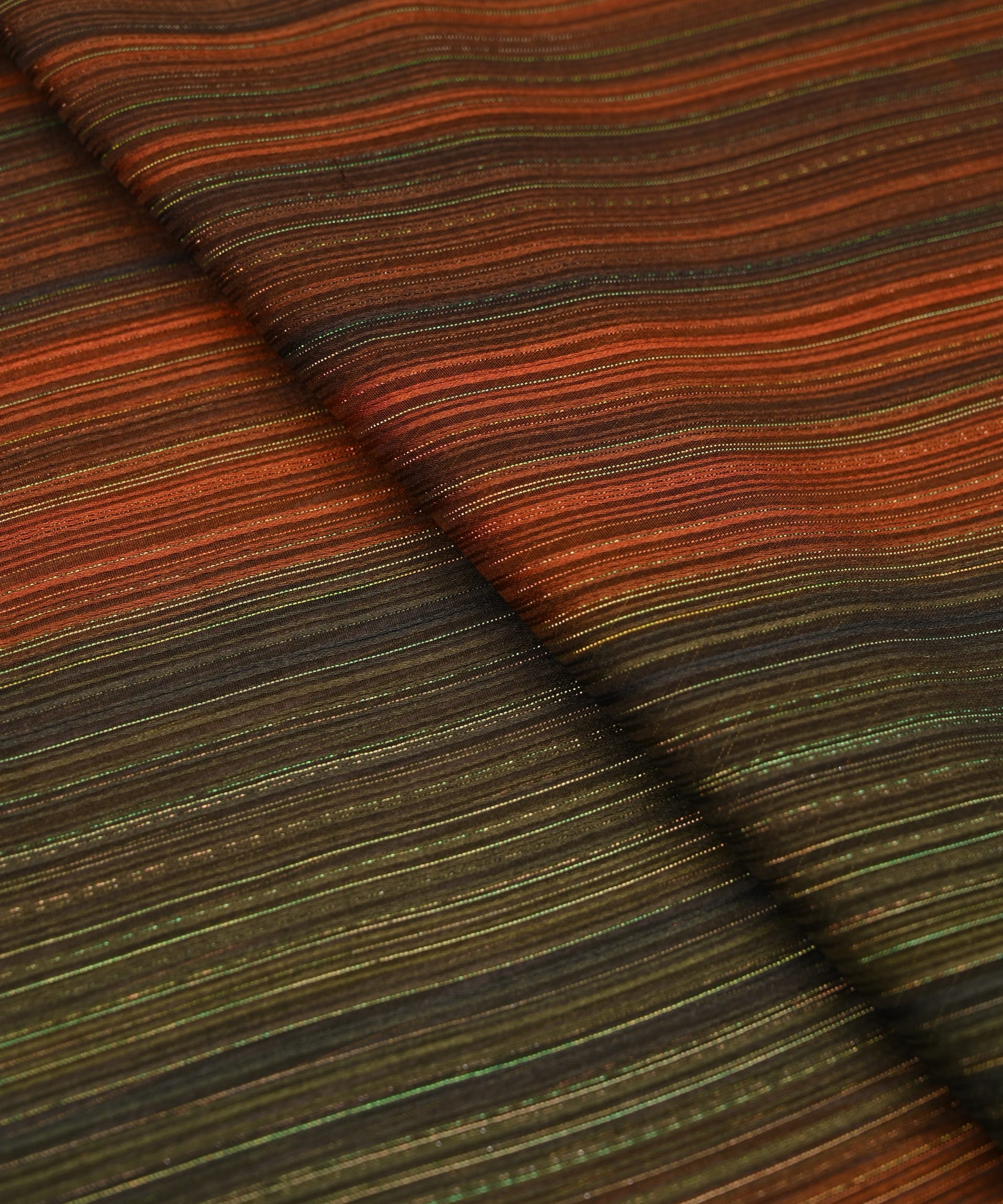 Rust Orange Shaded Georgette Fabric with Satin and Zari Stripes