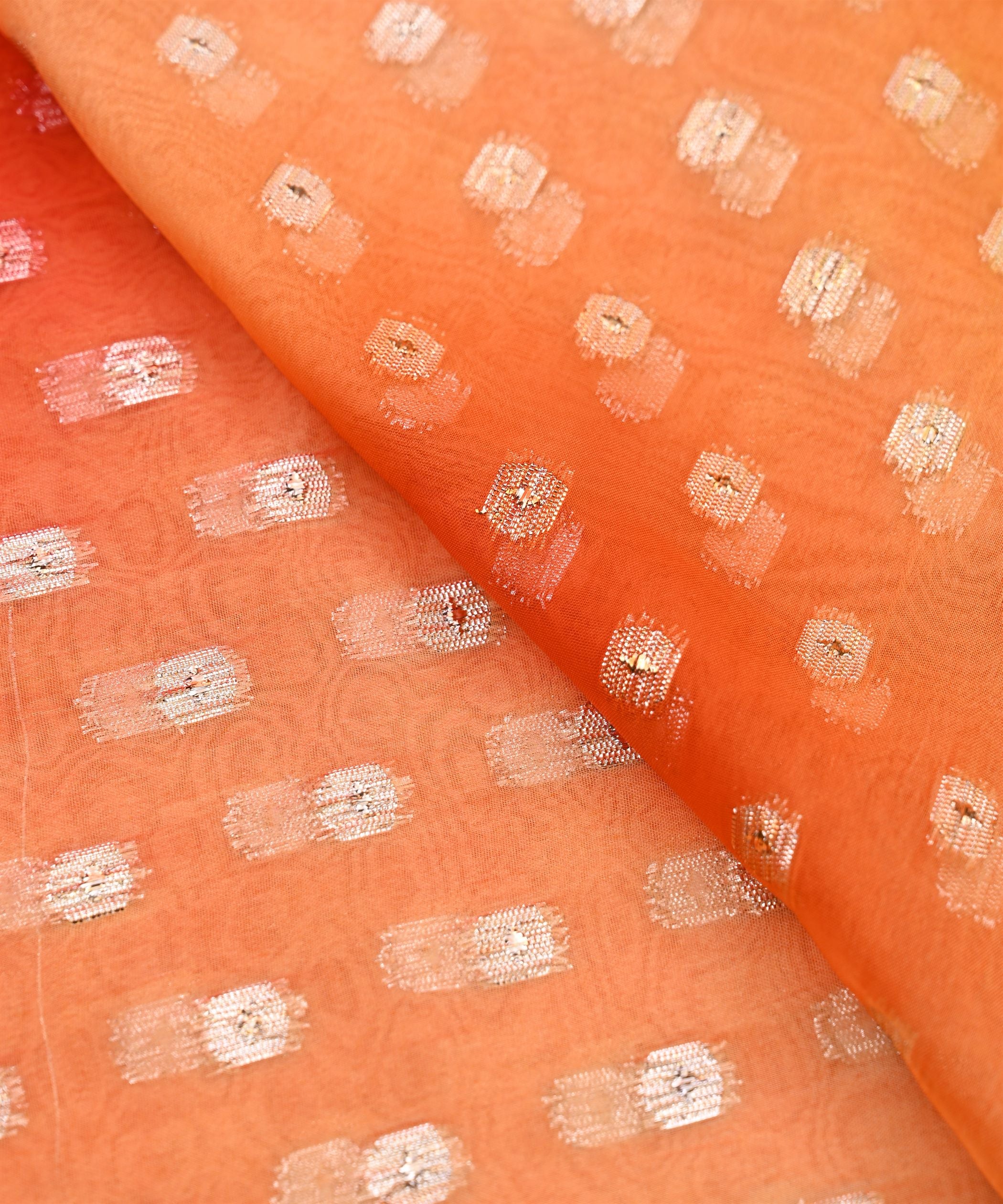 Orange Spray Print Georgette Fabric with Zari Design