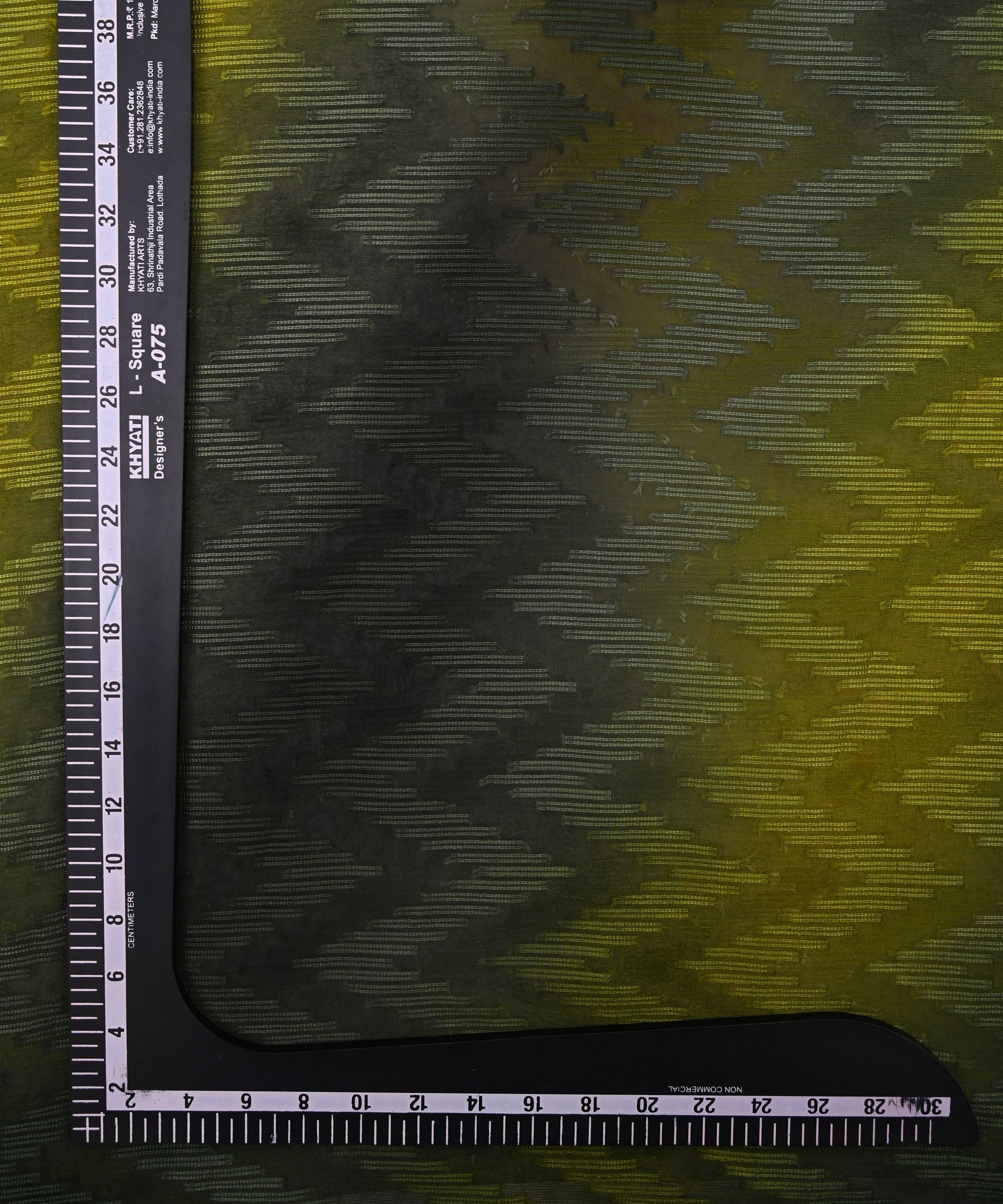 Lime Yellow Spray Print Georgette Fabric with Zig Zag Lining