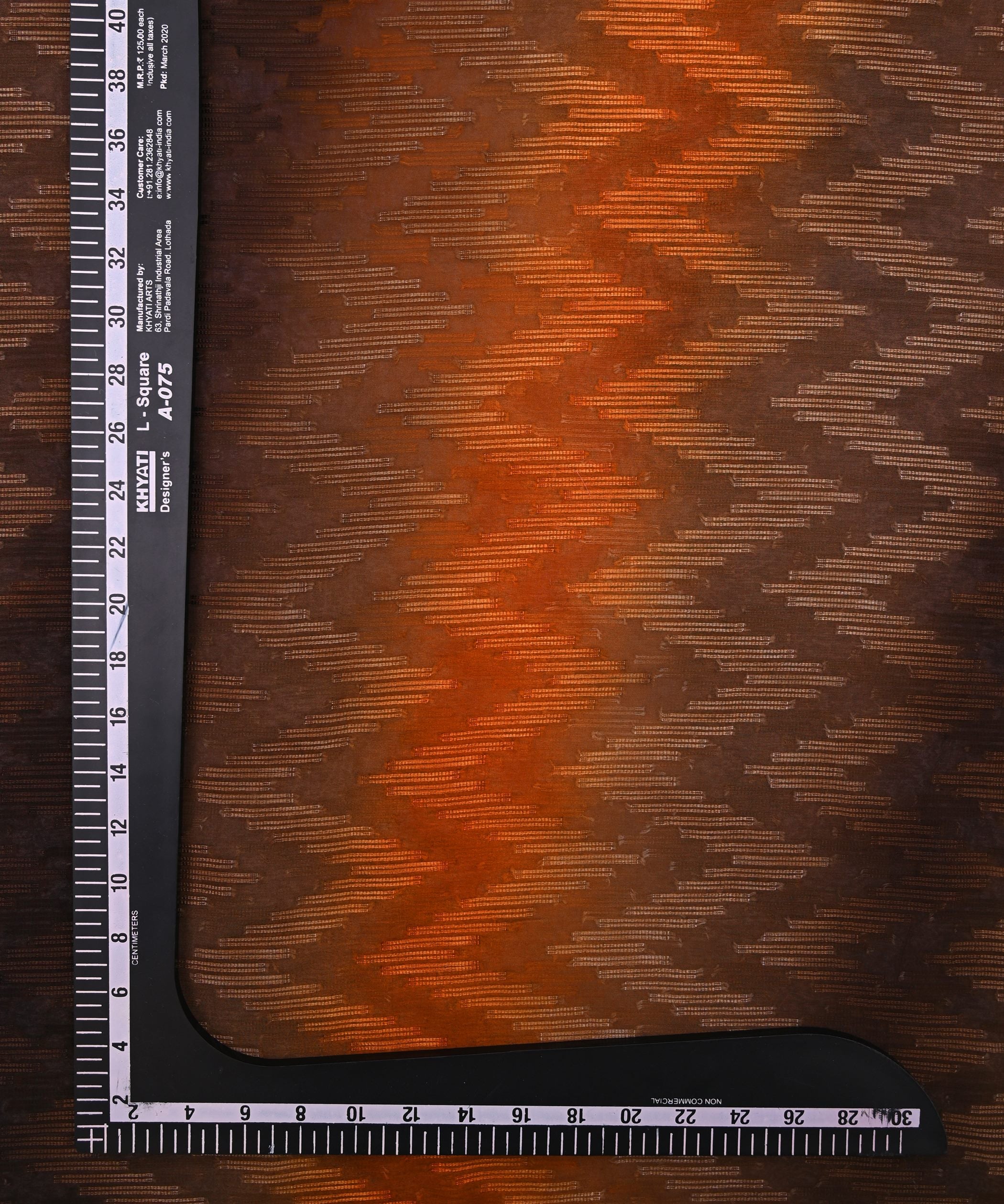 Rust Orange Spray Print Georgette Fabric with Zig Zag Lining