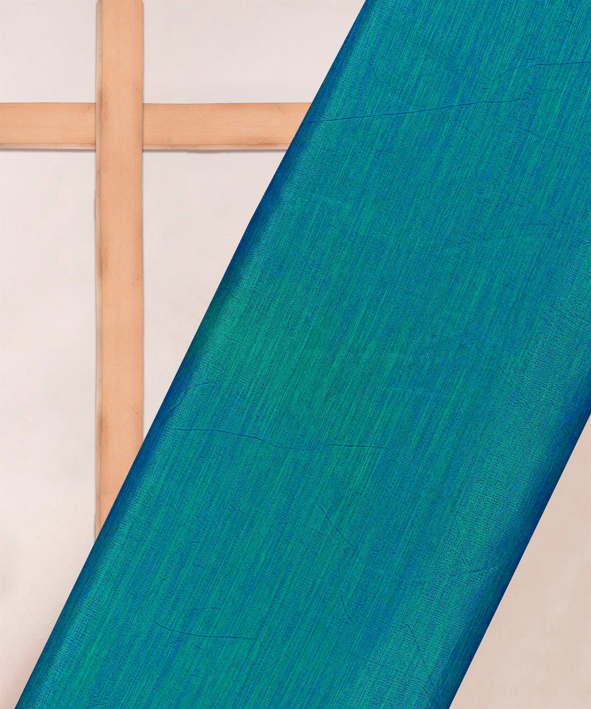 Peacock Blue Textured Semi Silk Fabric