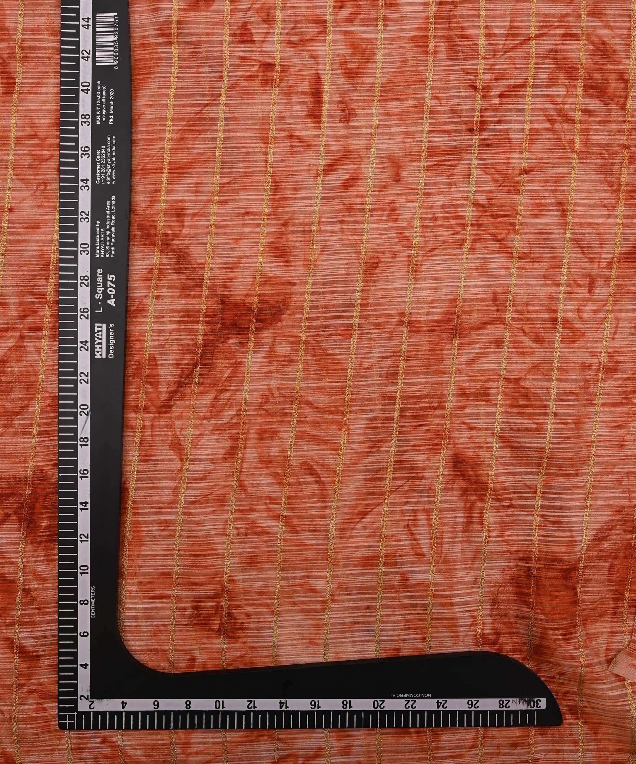 Orange Weightless Fabric with Shibori and Golden Stripes