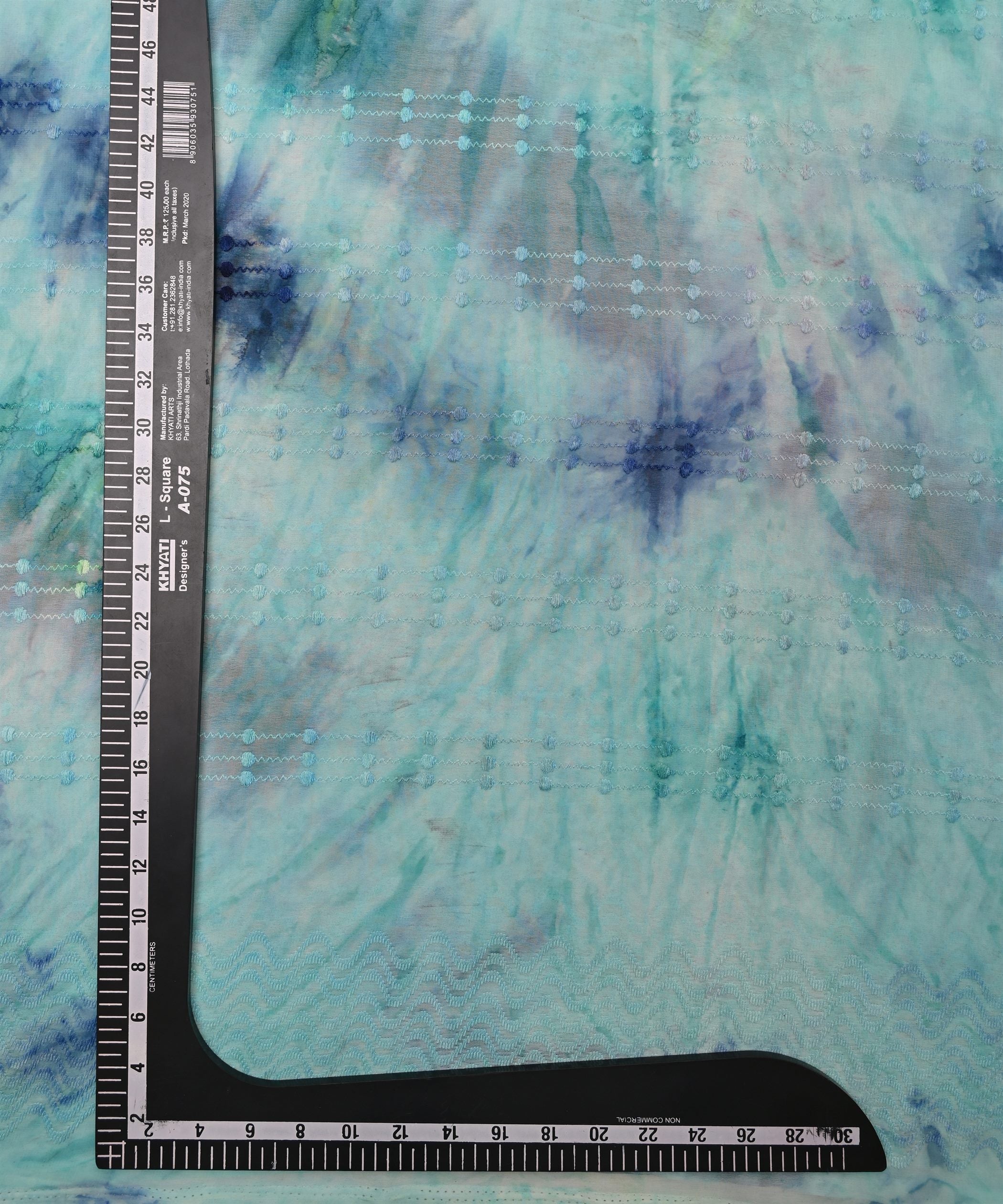 Blue Tie and Dye Weightless Fabric with Thread Lines